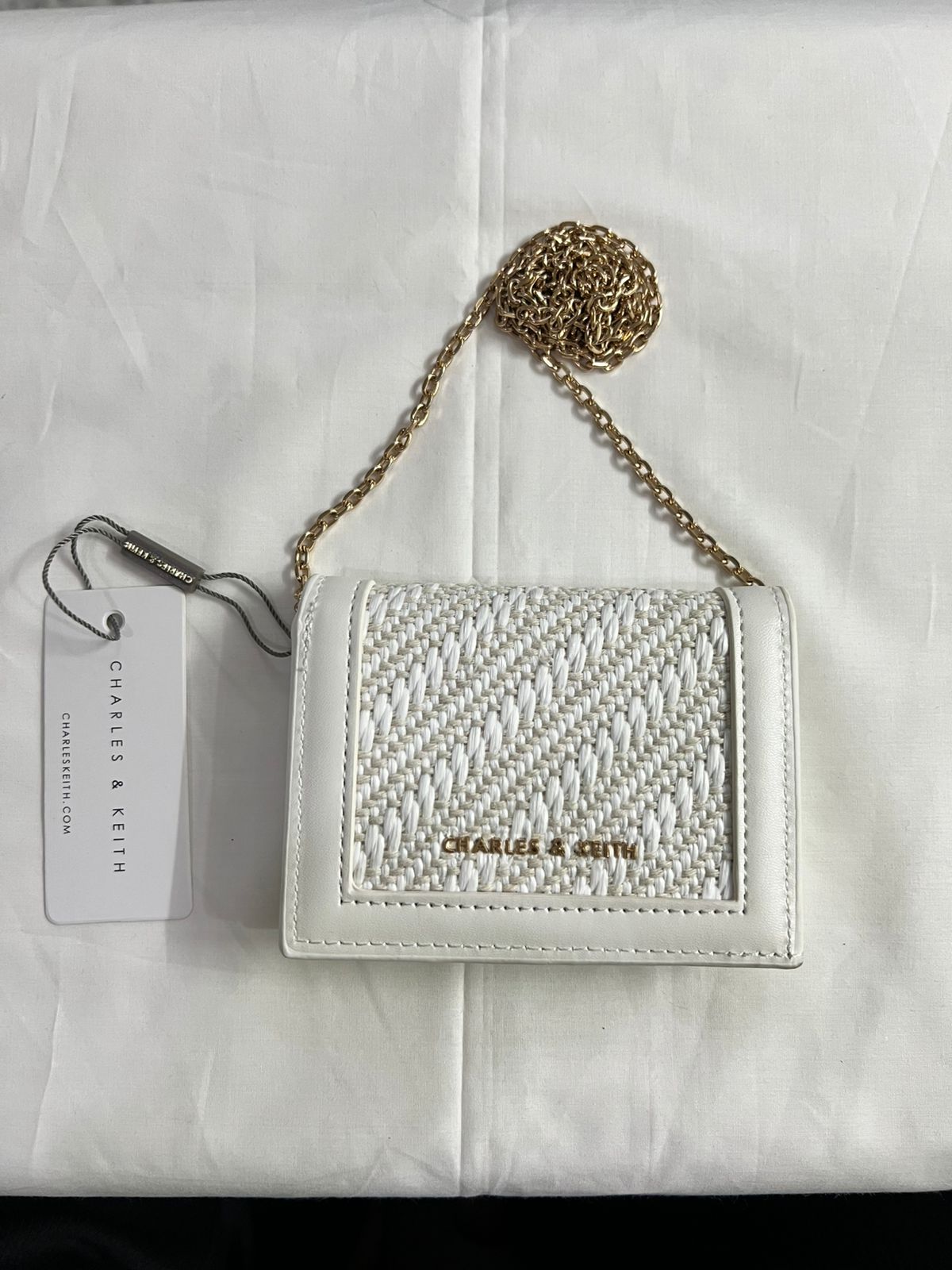 DESIGNER WALLET SLING